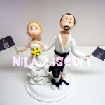 Bonequinhos do bolo de casamento com noivinho judoca