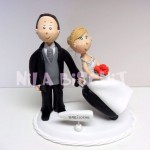 Bonequinhos do bolo de casamento noivos vão passar a lua de mel em Bariloche