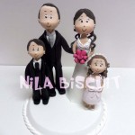 Miniatura personalizada dos noivos com 2 crianças