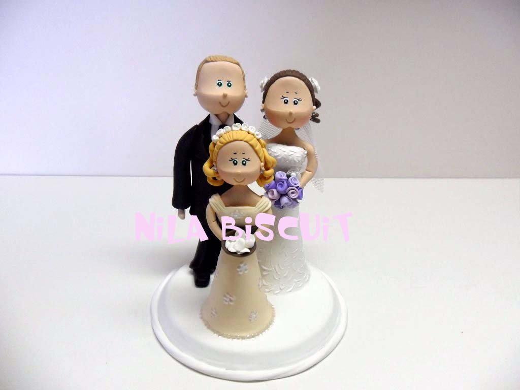 Miniatura personalizada dos noivos com filha